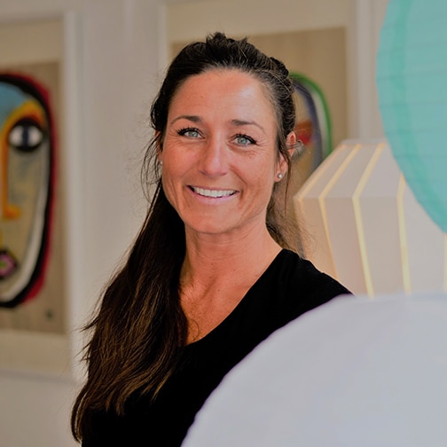 a woman smiling at the camera