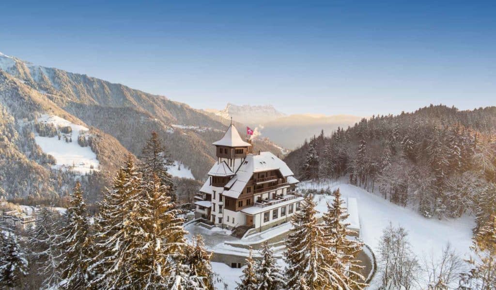 a building surrounded by snow